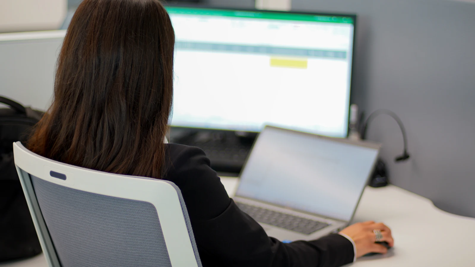 A screen of records being filtered, viewed over the shoulder
